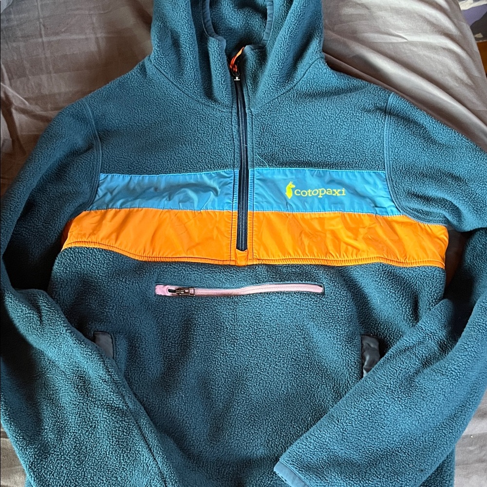 Cotopaxi Teal Fleece with Orange and Blue Accents
